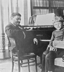 Einstein at the home of Leiden physics professor Paul Ehrenfest, 1920. On his lap is Paul Ehrenfest, Jr.