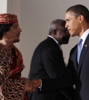 Муаммар Каддафи и Барак Обама