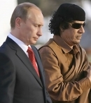 Владимир Путин и Муаммар Каддафи