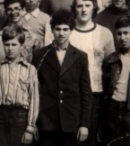 Григорий в пионерском лагере (первый ряд, второй справа, в школьном пиджаке)